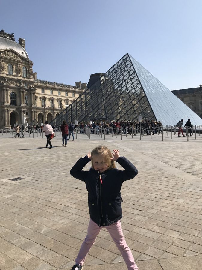 Star jump at the Louvre pyramid