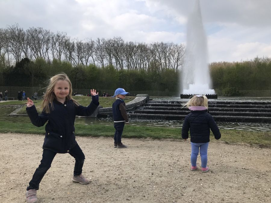 Dancing by a fountain at Versailles